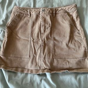 H&M tan or khaki mini skirt with white thread - so cute for summer!